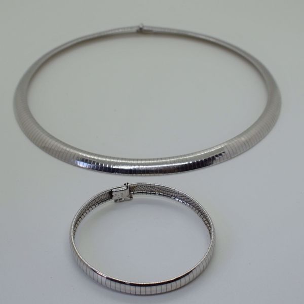 Afbeelding van WITGOUDEN ARMBAND EN HALSSNOER